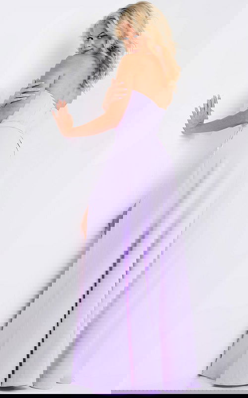 back view of model wearing 23150 lilac dress showcasing the elegant silhouette