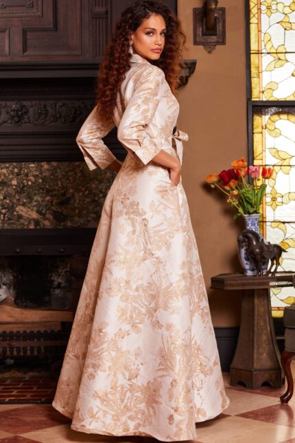 Back view of model wearing Jovani 23178 gold dress with floral pattern