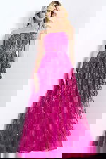 Hot pink glitter tulle prom dress with structured corset and flowy skirt