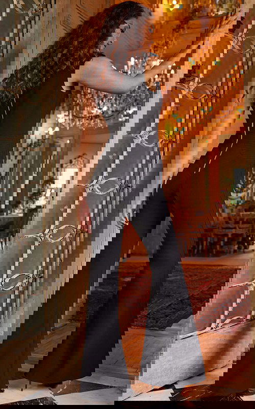 Back view of Jovani 23240 black jumpsuit showing zipper detail.