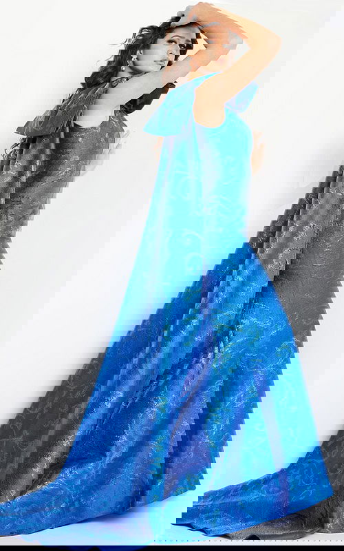 Back view of Jovani 23742 royal blue gown with detailed shoulder drape.