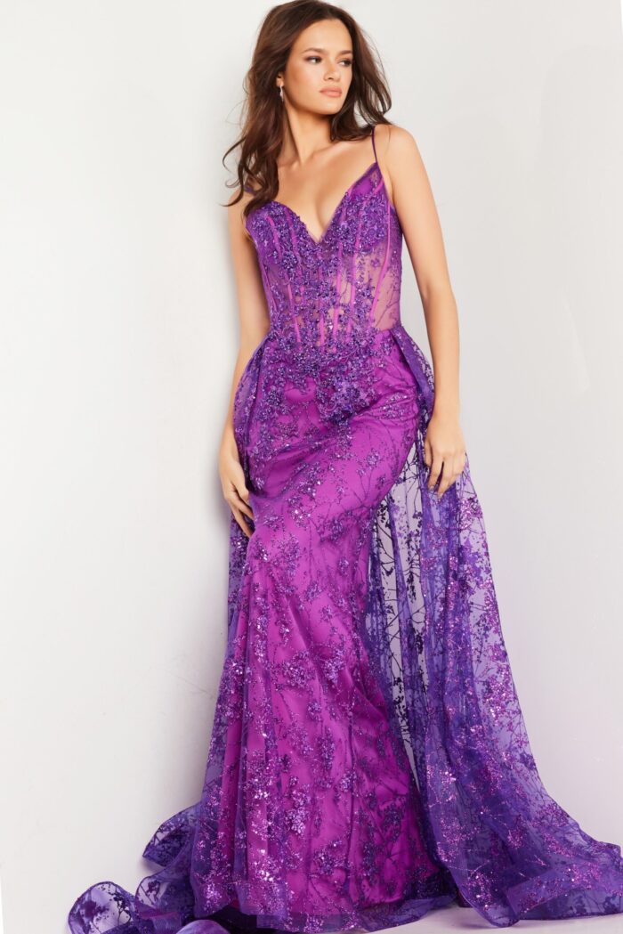 Model wearing glamorous Jovani 23530 royal blue dress with sheer details