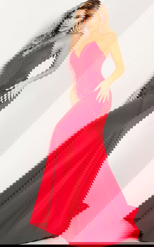 Model wearing Jovani 23556 elegant red mermaid dress, front view.