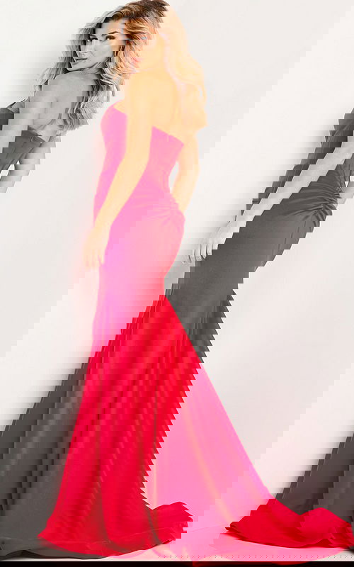 Model wearing Jovani 23556 elegant red mermaid dress, back view.