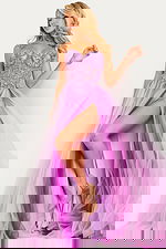 Model wearing Jovani 23710 lilac gown with flowing tulle layers and high slit, front view.