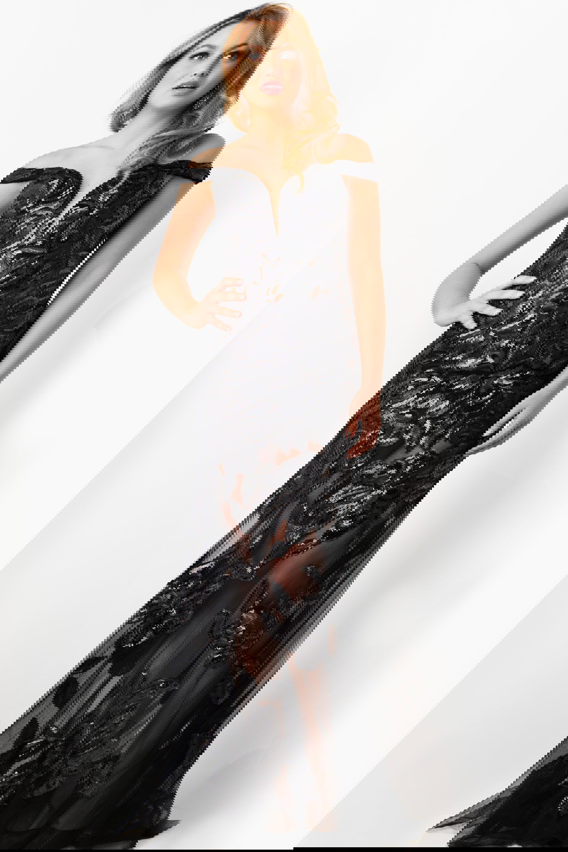 23834-BLACK-3-2.jpg Model wearing Jovani 23834 black lace gown front view