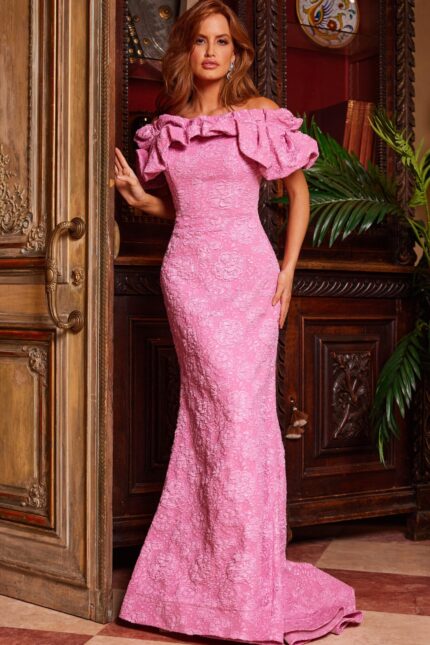 Model wearing Jovani 23847 pink lace dress with ruffled off-the-shoulder neckline