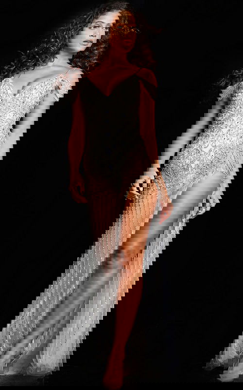 Model wearing Jovani 23961 white dress front view with V-neckline and off-shoulder sleeves.