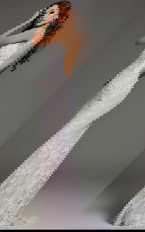 model showcasing the back of Jovani 23965 white mermaid gown with low back design