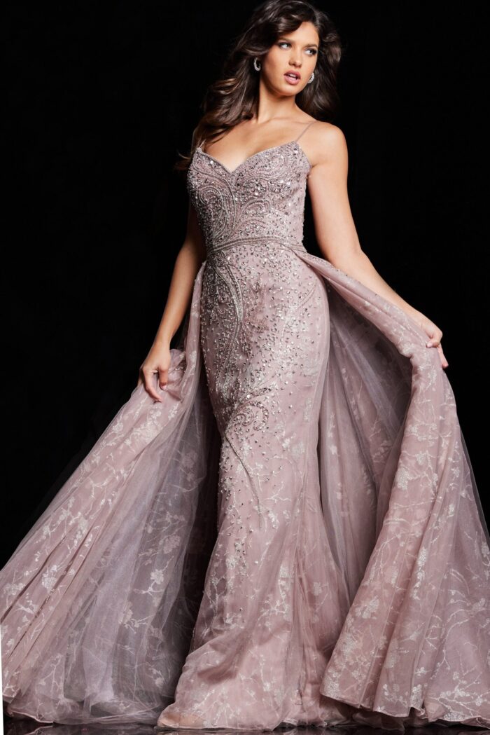 Model wearing Jovani 24001 taupe dress with A-line silhouette and bead details.