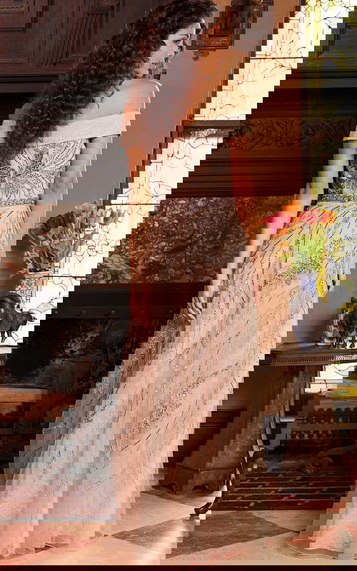 Back view of Jovani 24055 beige dress, featuring off-the-shoulder neckline and intricate embroidery.