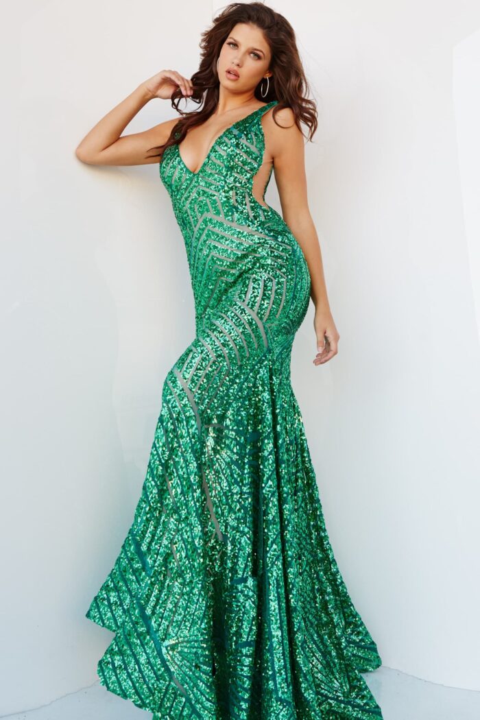 Model in Jovani 24097 green dress, illustrating the V-neckline and bead patterns.