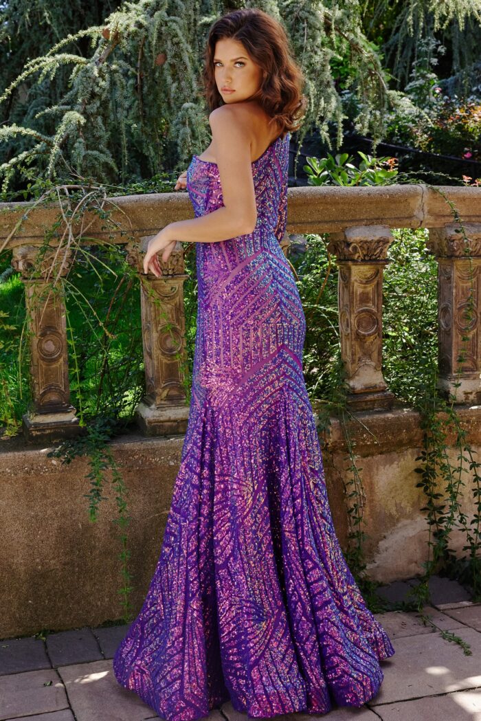 Back view of model wearing Jovani 24098 lilac dress with mermaid silhouette