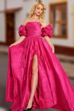 Model wearing Jovani 24099 fuchsia gown with high slit, off-the-shoulder neckline and puff sleeves.