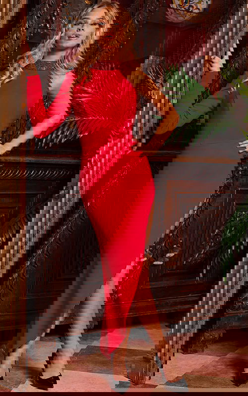 Model wearing Jovani 24103 red dress with high slit and one sleeve, front view.