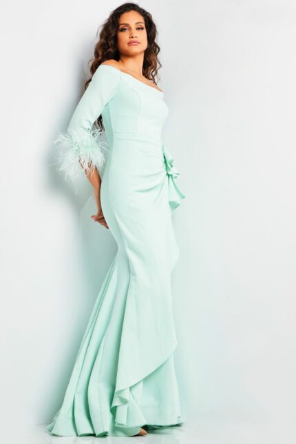 Model wearing Jovani 24195 green gown from back view