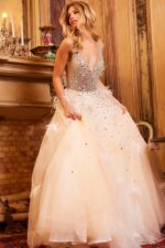 Front view of Jovani 24255 dress featuring a plunging V-neckline and A-line silhouette in nude.