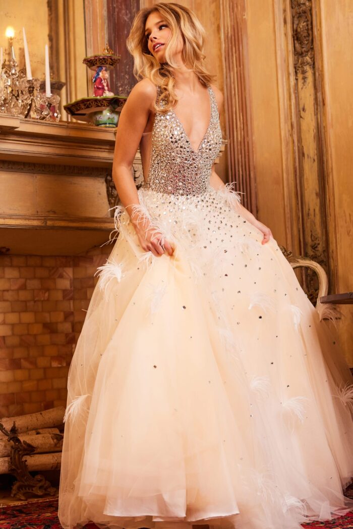 Front view of Jovani 24255 dress featuring a plunging V-neckline and A-line silhouette in nude.