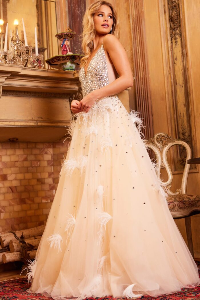 Side view of Jovani 24255 gown with a fitted bodice and flowing skirt in nude.