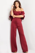 Model featuring Jovani 24278 burgundy dress, displaying front details and fitted silhouette.