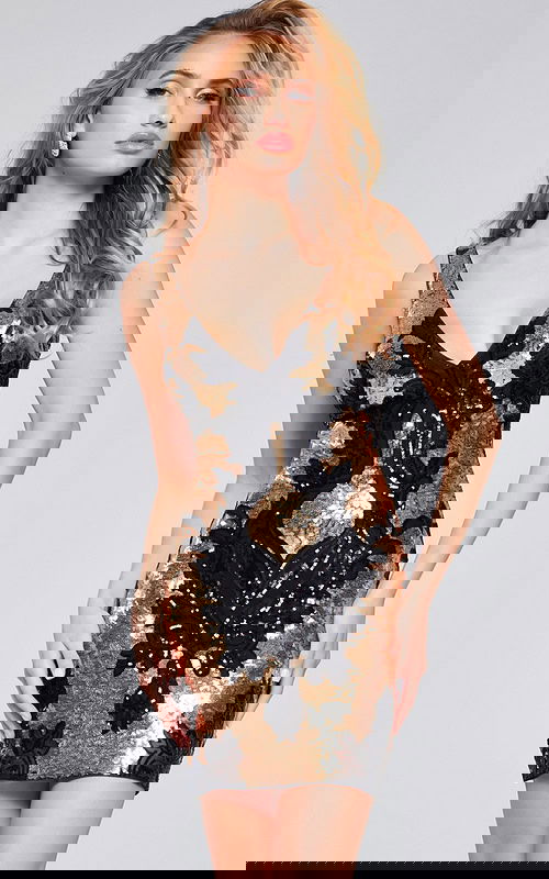 Model wearing Jovani 24510 in black with front view showcasing sequin detailing and V-neckline.