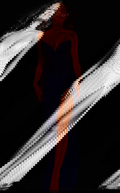 Model wearing Jovani 24654 floor-length dress with sweetheart neckline and high slit, front view.