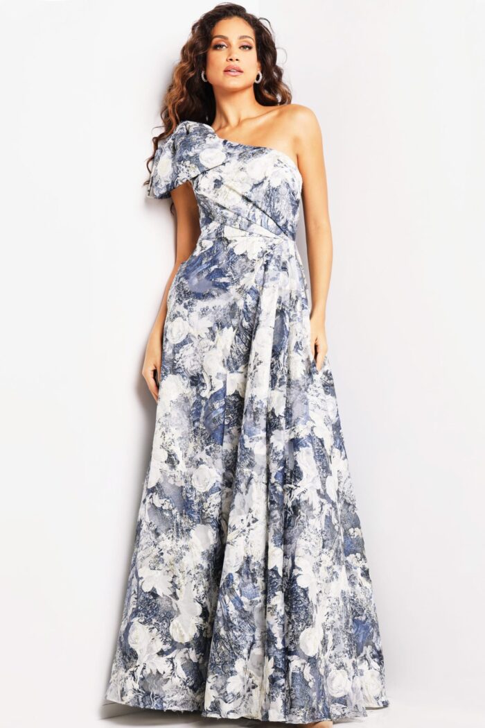 Model wearing Jovani 25663 dress featuring a printed A-line silhouette and one-shoulder neckline.