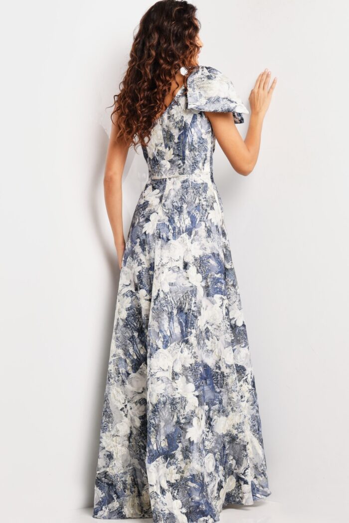 Back view of model wearing Jovani 25663 dress showing off the printed pattern and one-shoulder design.