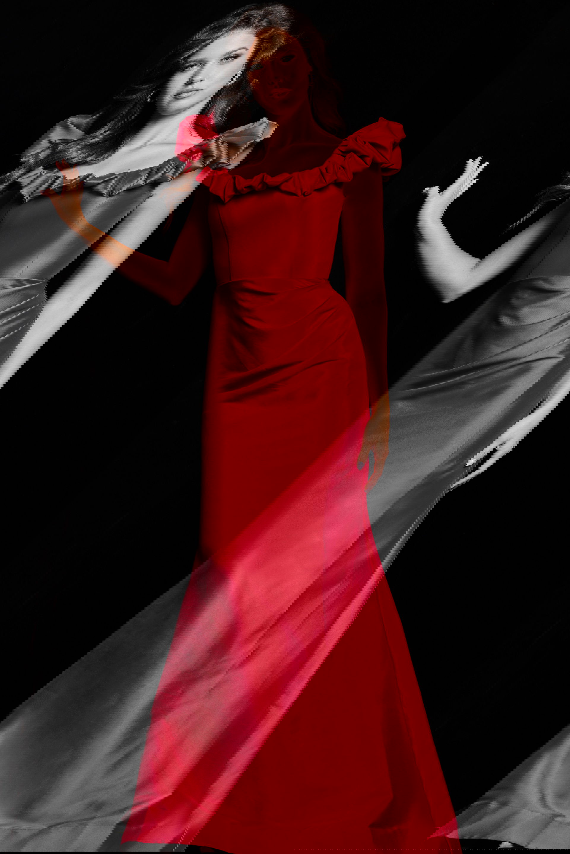 25675_RED_25.jpg Model wearing 25675 red dress with ruffled neckline from the front view