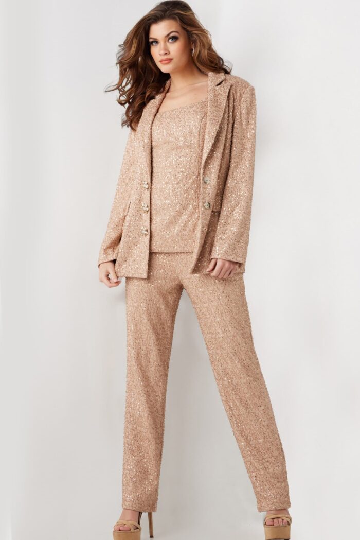 Model wearing Jovani 25773 beige sequin blazer and trousers ensemble, alternative front view.