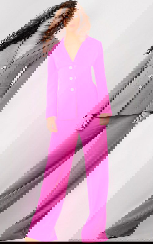 Model wearing Jovani 25834 pink blazer and wide-leg trousers, front view