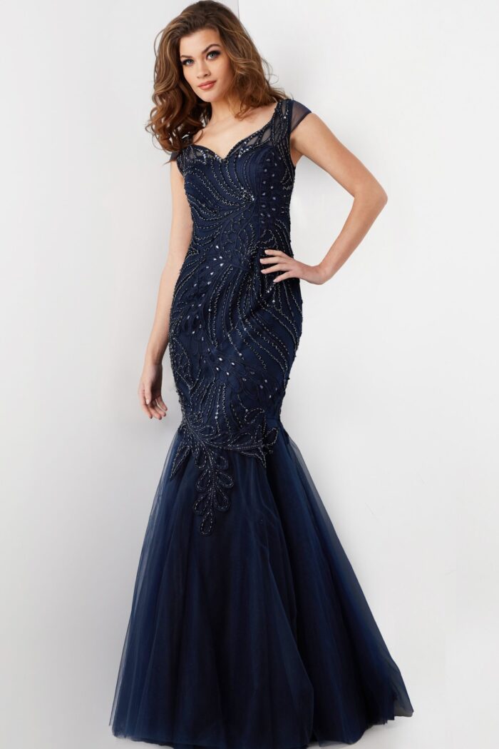 Model wearing Jovani 25850 navy mermaid dress with embroidery and sequins, front view.