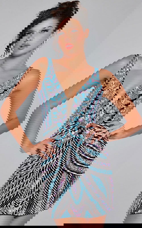 Model wearing Jovani 25925 in black with intricate beadwork and V-neckline, front view.