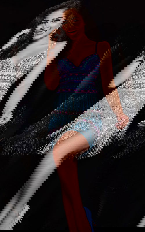 Model wearing Jovani 25926 dress, front view, multi-colored with V-neckline and fringe detailing.