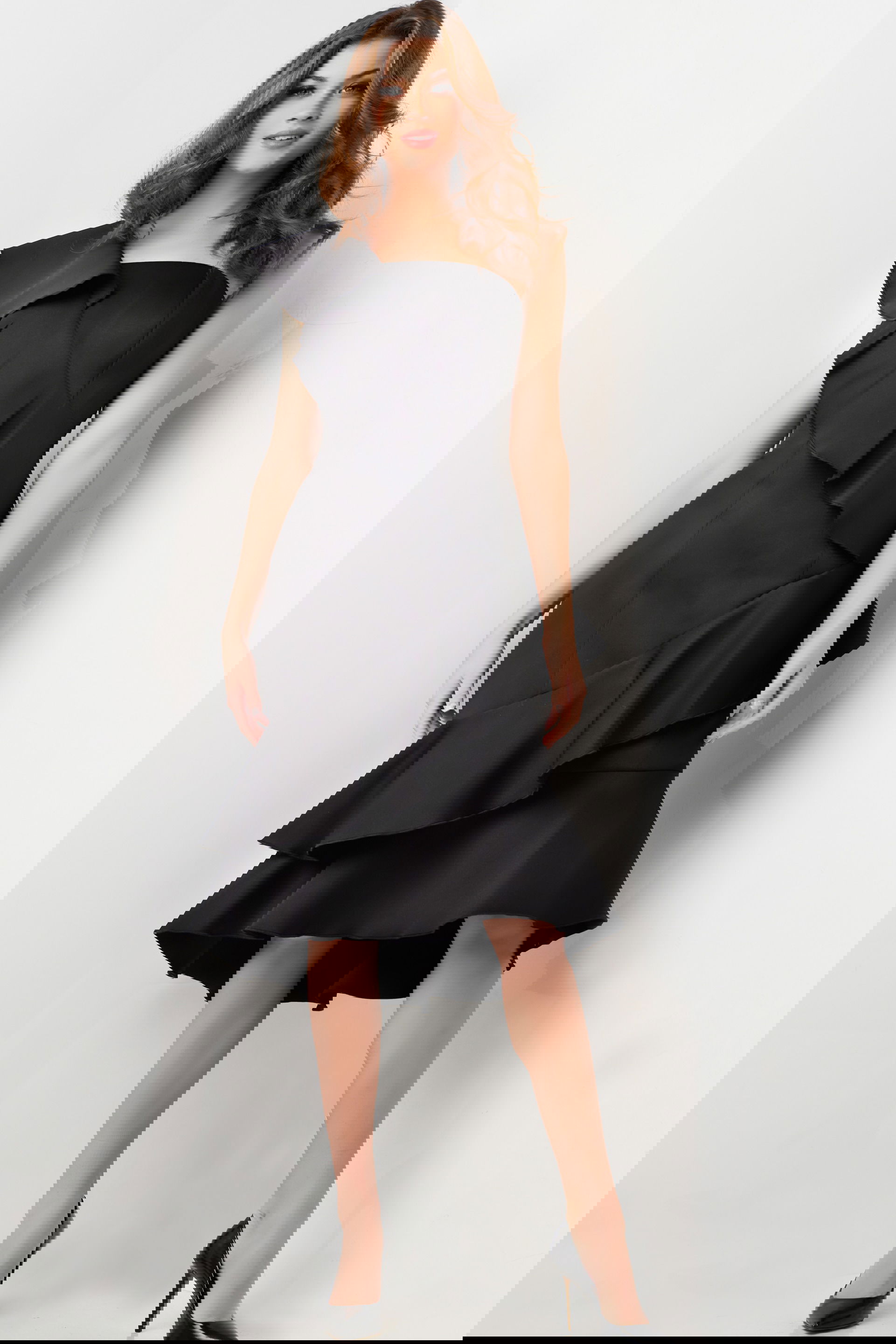 25971-BLACK-21.jpg Model wearing Jovani 25971 elegant black dress with one-shoulder ruffle design.