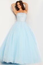 model wearing Jovani 25991 blue ball gown, relaxed pose, front view.