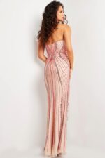 back view of model wearing 26043 nude gown with intricate detail work