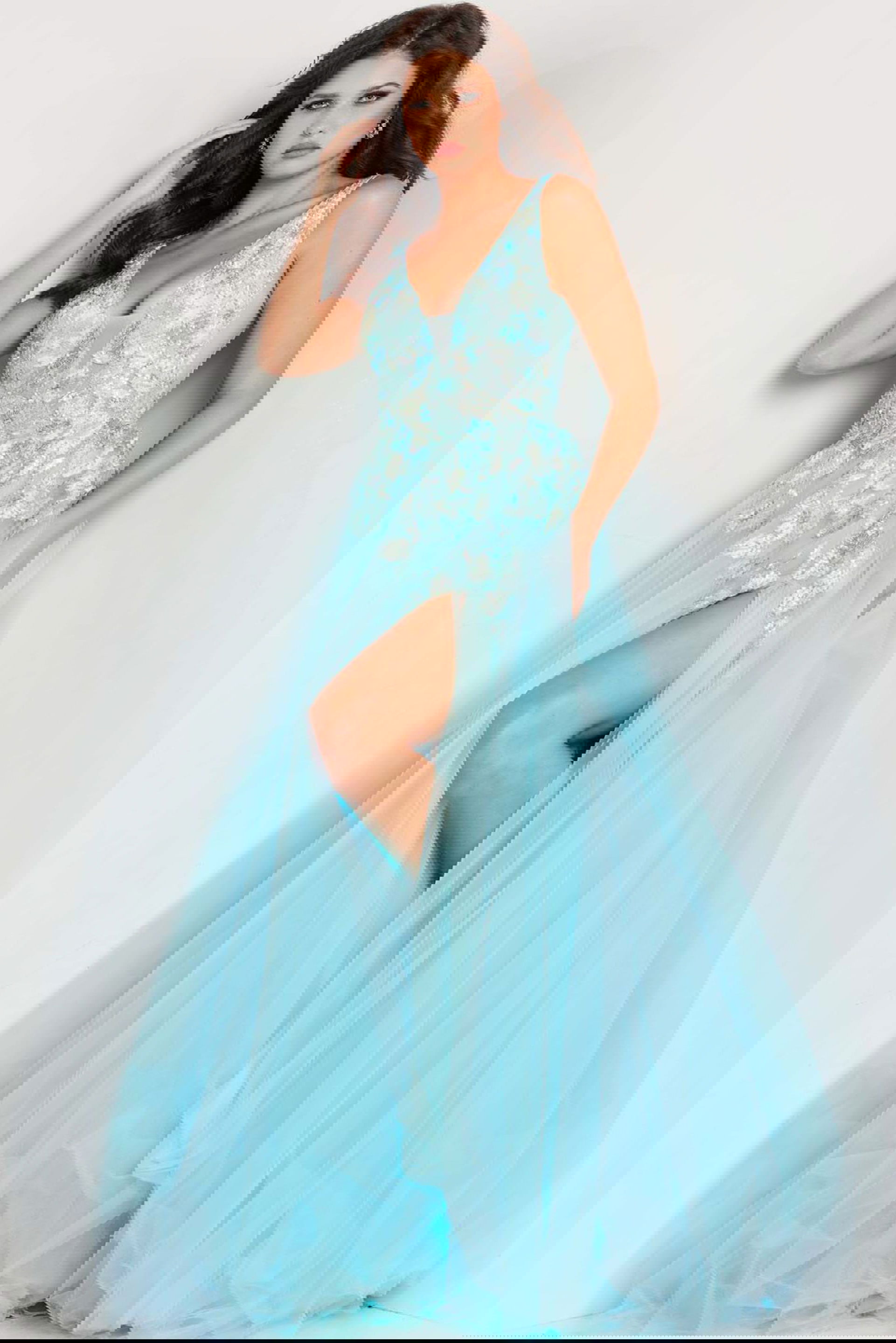 26045_3.jpg Model wearing Jovani 26045 front view of blue gown with V-neckline and high slit.