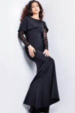 Model wearing 26062 elegant black gown with boat neckline and lace sleeves