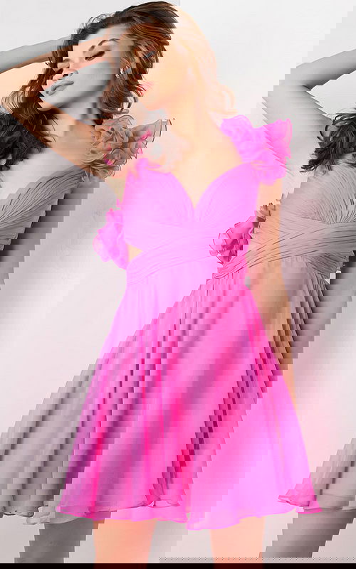 Model wearing Jovani 26139 pink dress featuring a sweetheart neckline and playful ruffles, front view.