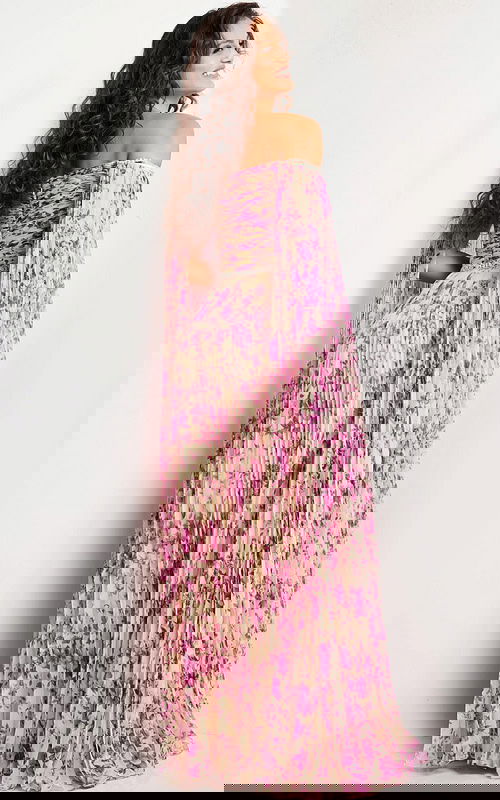 Model wearing Jovani 26141 in printed fabric showcasing the back detailing.