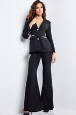 Model wearing Jovani 26144 black outfit with deep V-neckline and chic wide-leg pants.