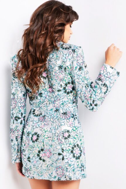 Model wearing Jovani 07807 multi-color dress with long sleeves and floral design, back view.