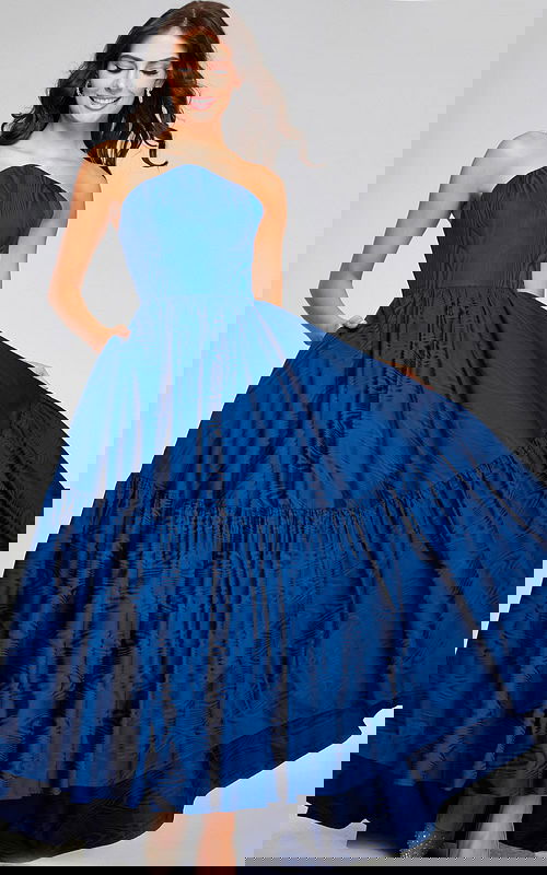 Model wearing Jovani 26152 with a navy A-line strapless gown, front view, full-length.