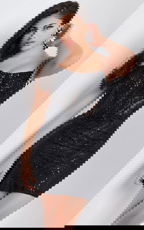 Model wearing Jovani 26183 black mini dress with sequins and thin straps, front view