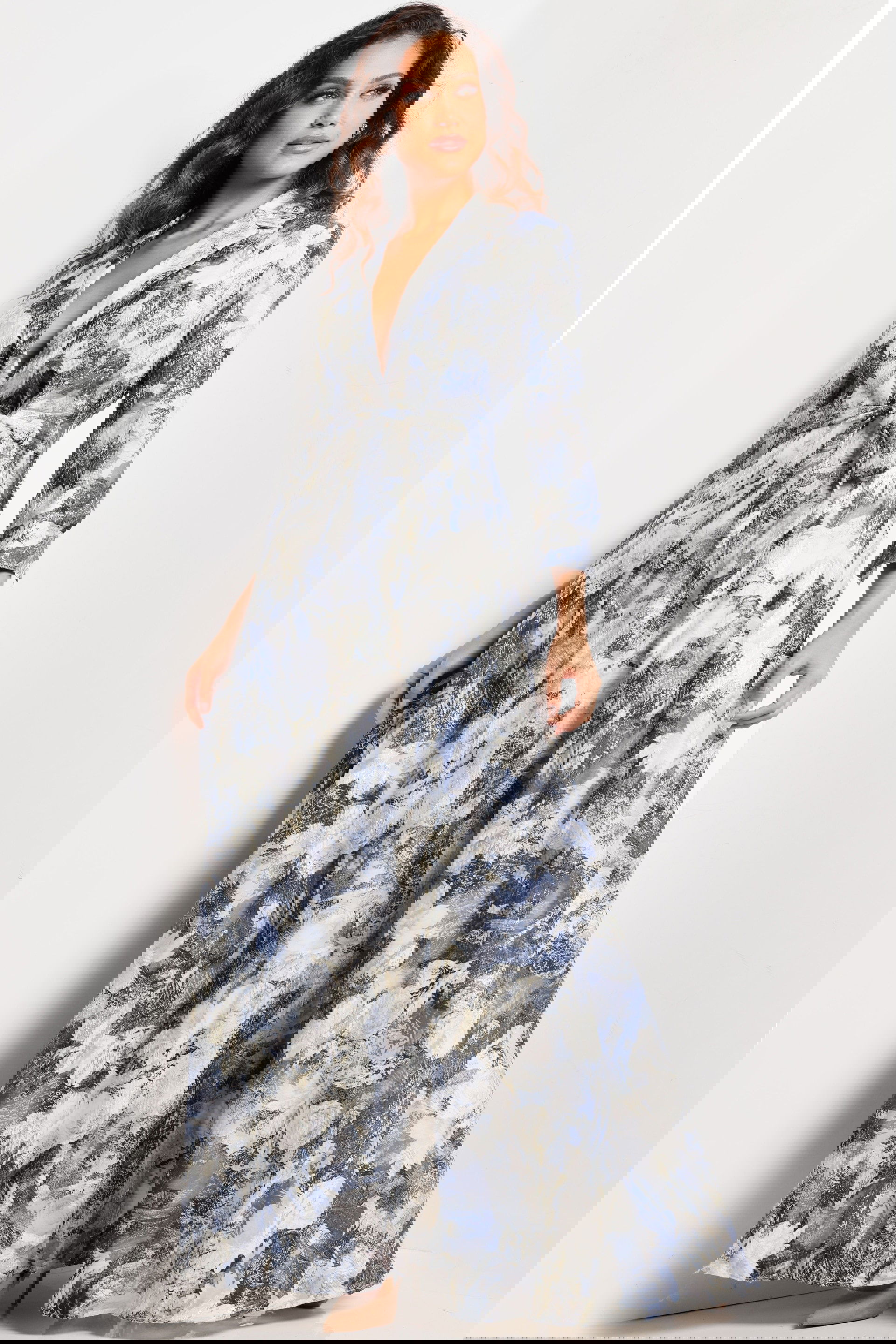 26202_PRINT_17.jpg model wearing Jovani 26202 printed dress in full length with lapel neckline and long sleeves