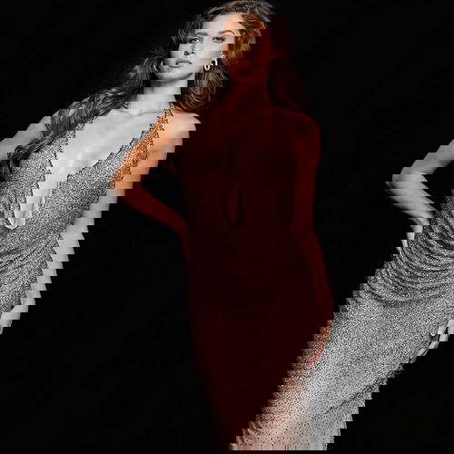 Model wearing Jovani 26268 taupe ombre dress, close-up front view.