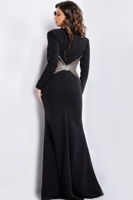 Back view of model wearing Jovani 26317 black gown highlighting intricate beadwork.