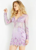 Model wearing Jovani 27205 Long Sleeve V Neck Embellished Short Dress