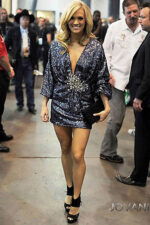 Model wearing Carrie Underwood in Jovani 158975